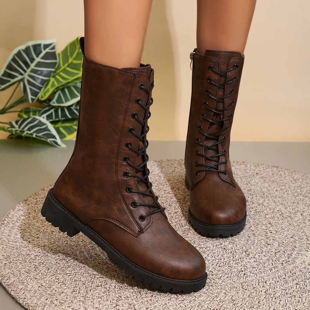 Botas de caña media para mujer acordonadas con suela de perfil grueso y acabado en grano fino