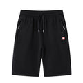 Shorts deportivos lisos con bolsillos con cierre para hombre - Kevin